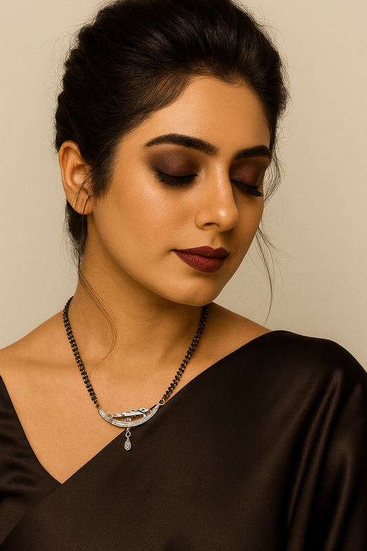 Silver-Plated Double Chain Mangalsutra with CZ Leaf Design & Ruby Drop Pendant – Elegant Daily Wear