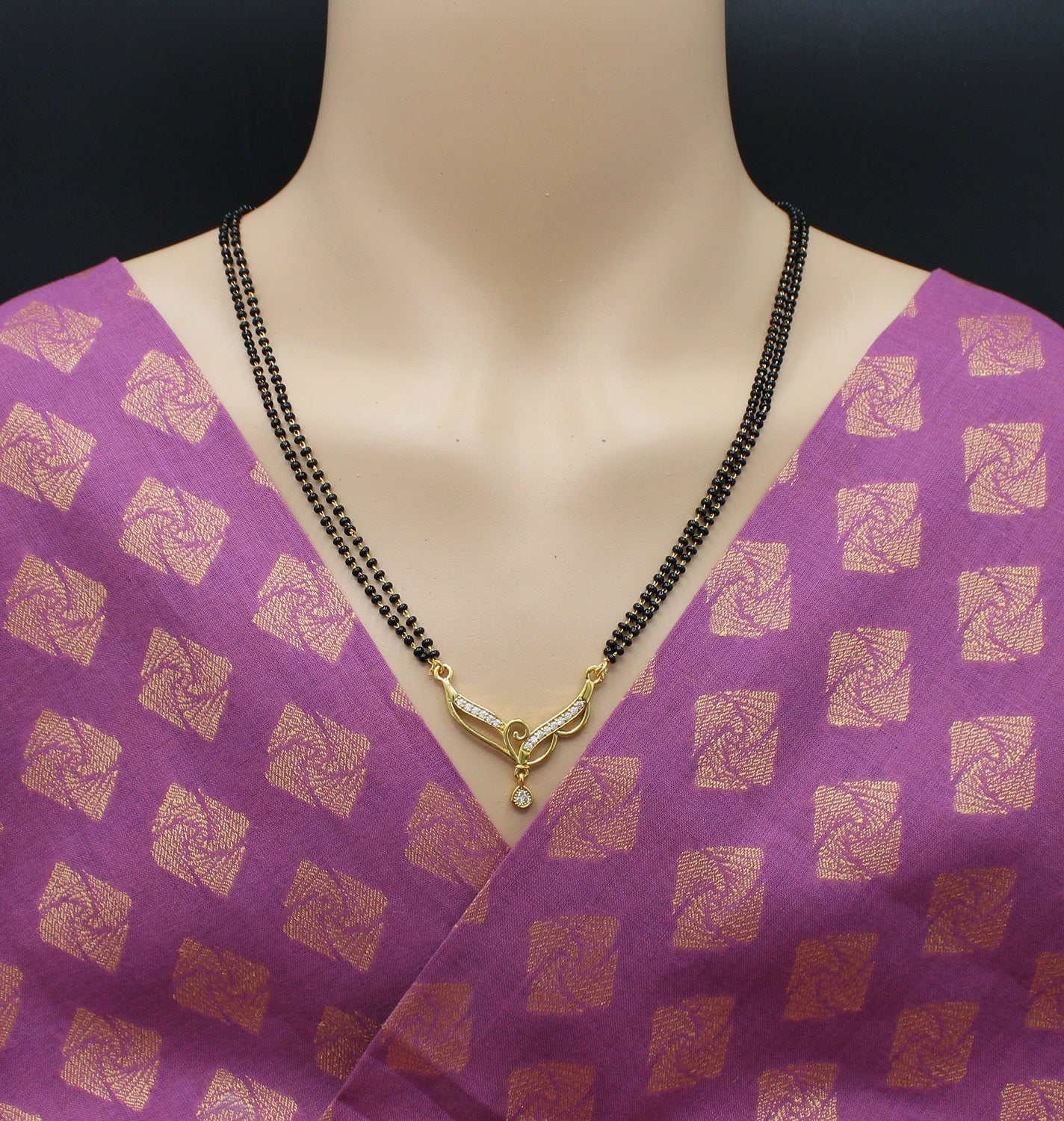 Elegant Double-Line Mangalsutra with Designer Gold-Plated Pendant