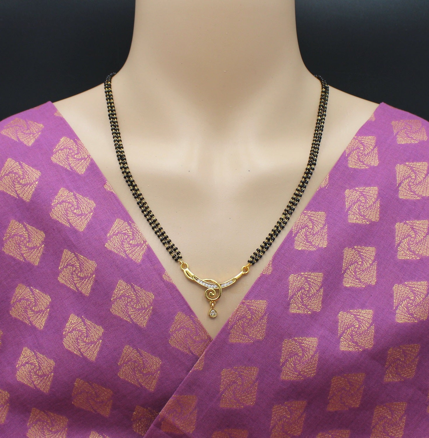 Elegant Double-Line Black Bead Mangalsutra with Golden Spiral Pendant