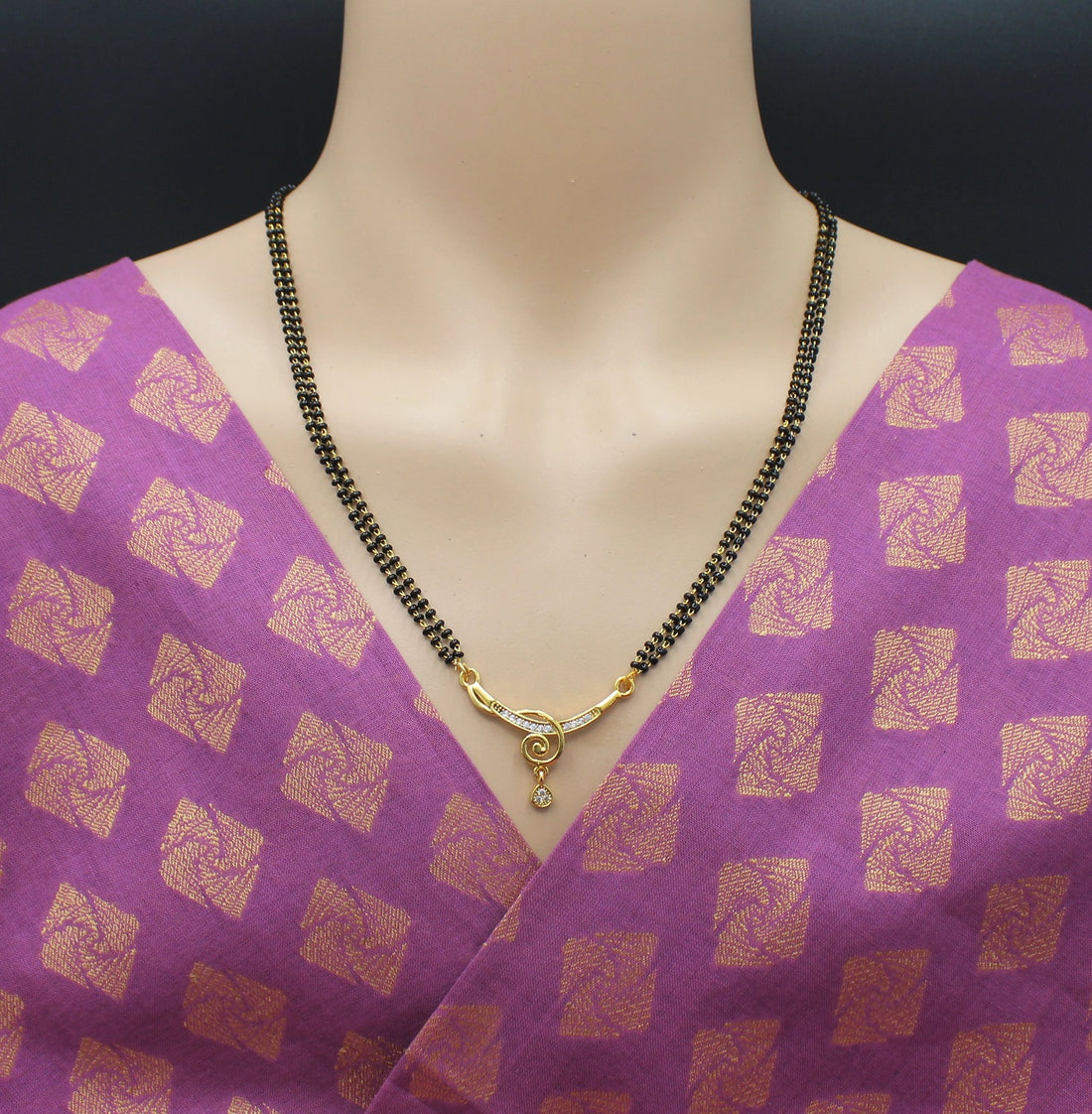 Elegant Double-Line Black Bead Mangalsutra with Golden Spiral Pendant