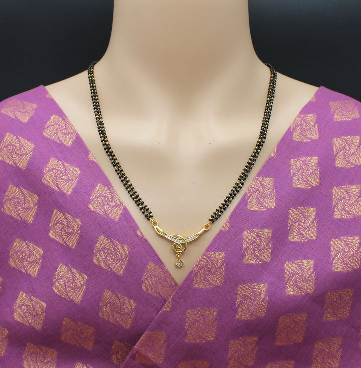 Elegant Double-Line Black Bead Mangalsutra with Golden Spiral Pendant