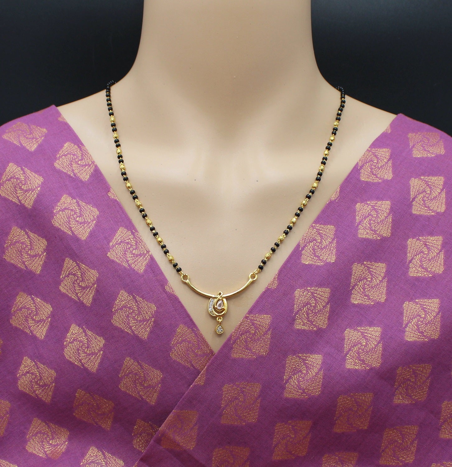 Elegant Single-Line Mangalsutra with Gold-Plated Oval CZ Pendant