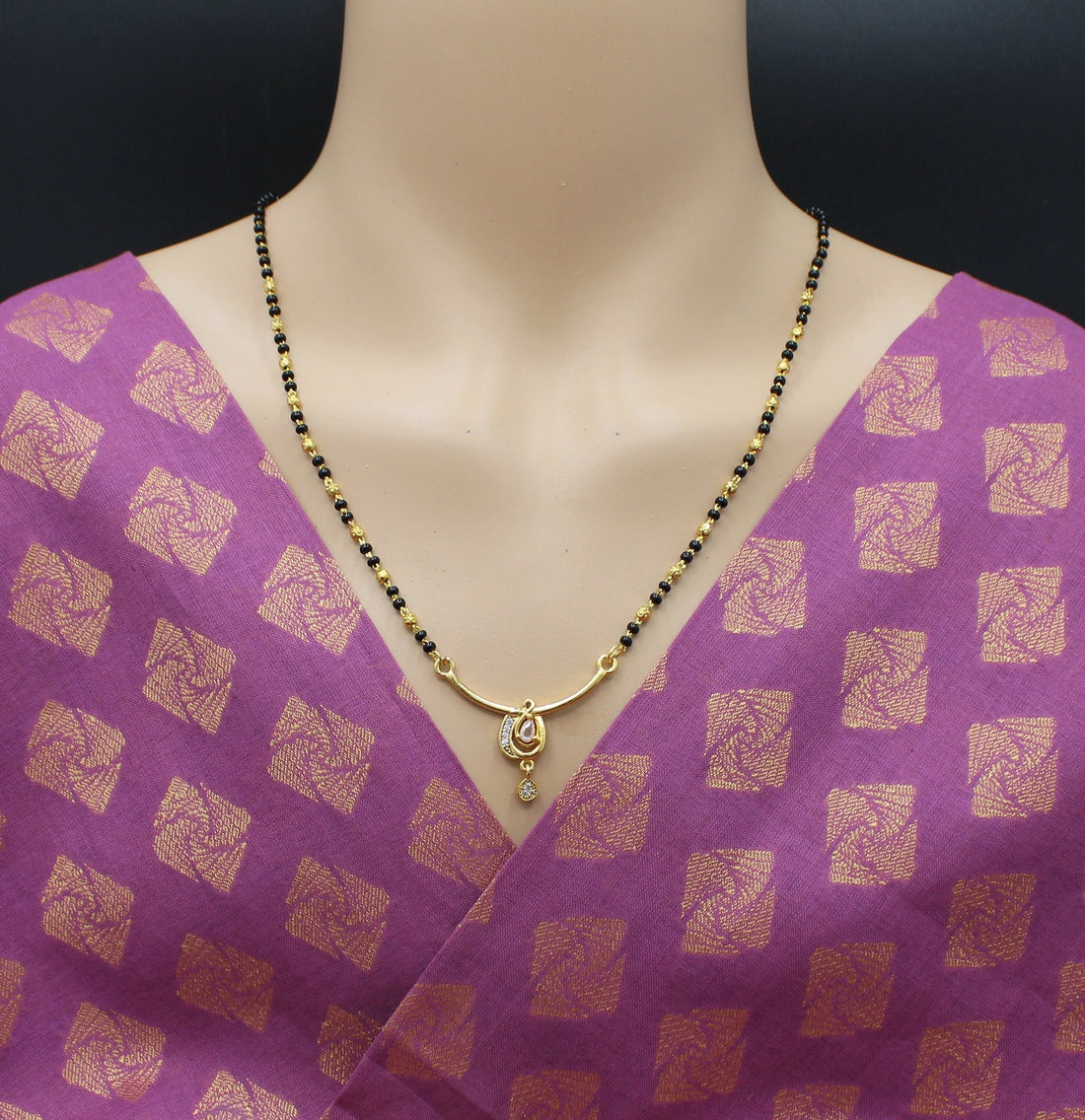 Elegant Single-Line Mangalsutra with Gold-Plated Oval CZ Pendant