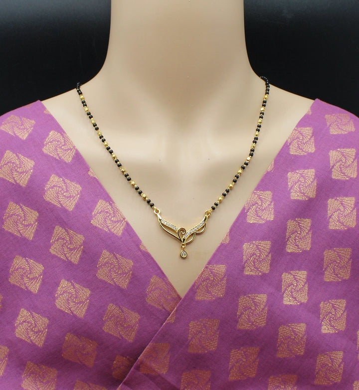 Elegant Black Bead Mangalsutra with Gold-Tone Pendant & CZ Stones