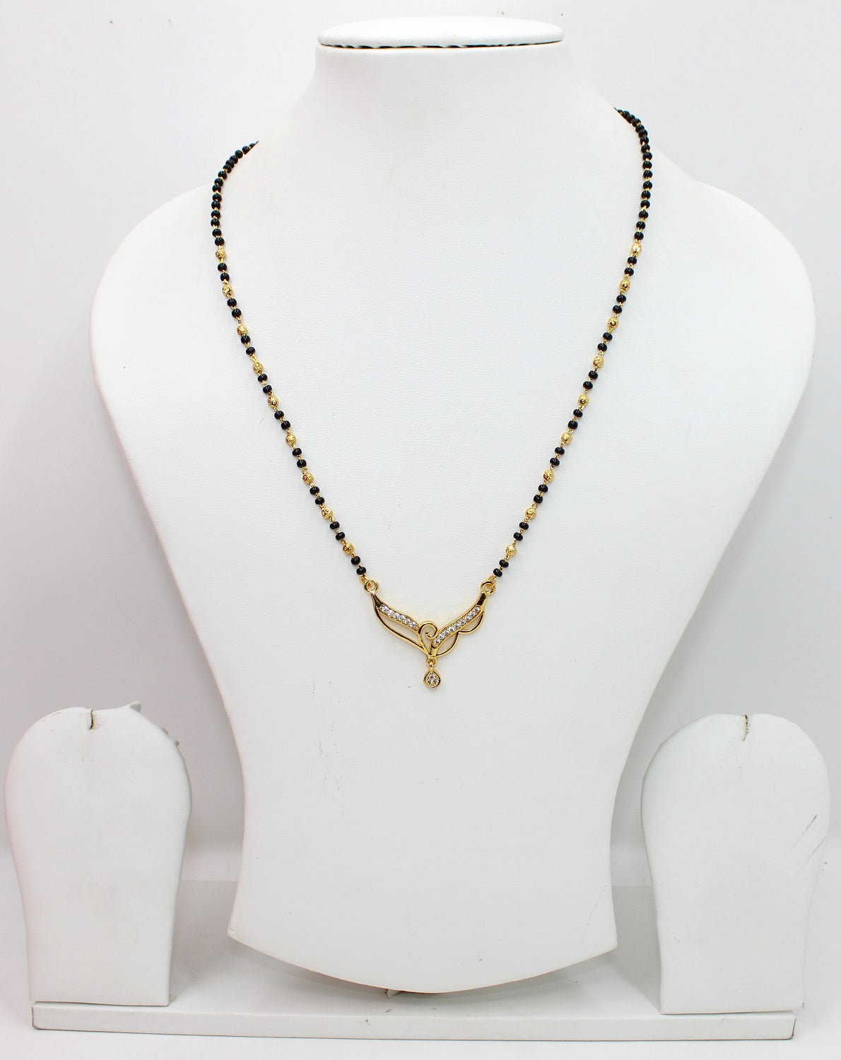 Elegant Black Bead Mangalsutra with Gold-Tone Pendant & CZ Stones