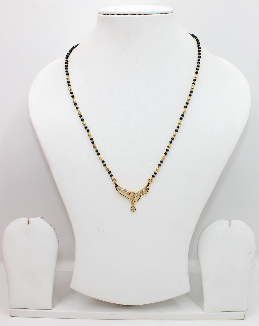 Elegant Black Bead Mangalsutra with Gold-Tone Pendant & CZ Stones