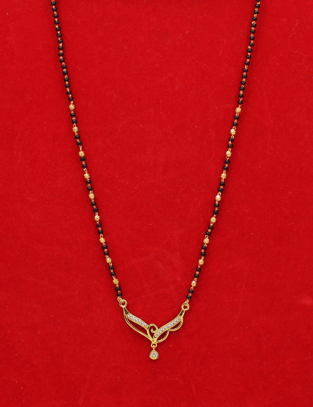Elegant Black Bead Mangalsutra with Gold-Tone Pendant & CZ Stones