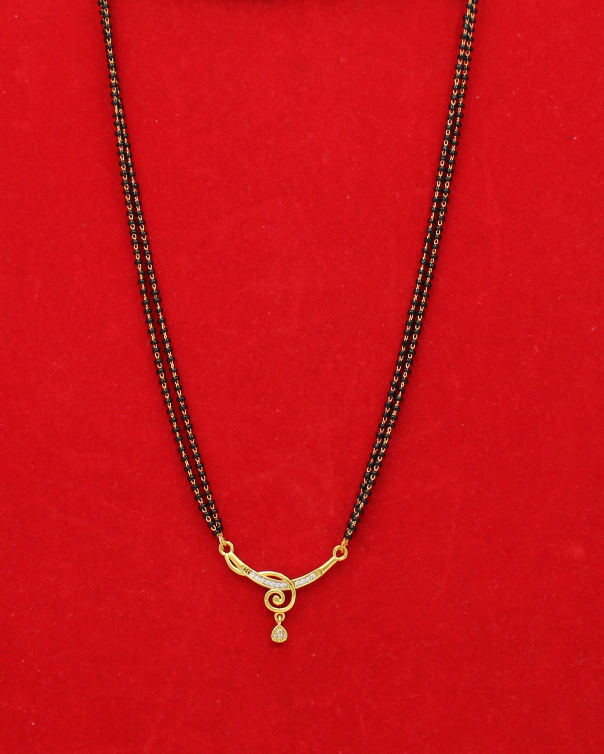 Elegant Double-Line Black Bead Mangalsutra with Golden Spiral Pendant