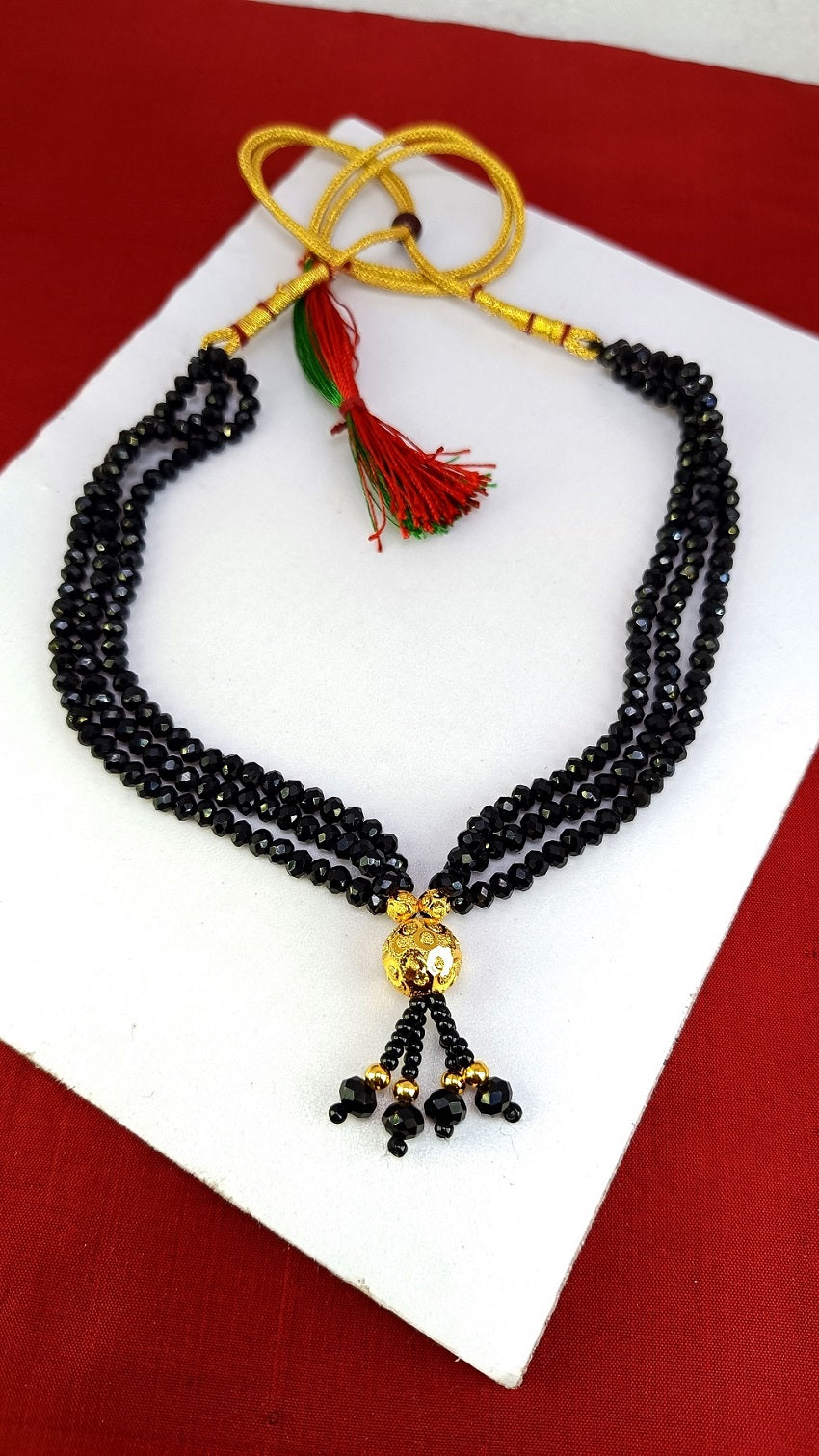 Royal Black Crystal Bead Mangalsutra with Golden Tassel Pendant – Modern Ethnic Elegance ✨