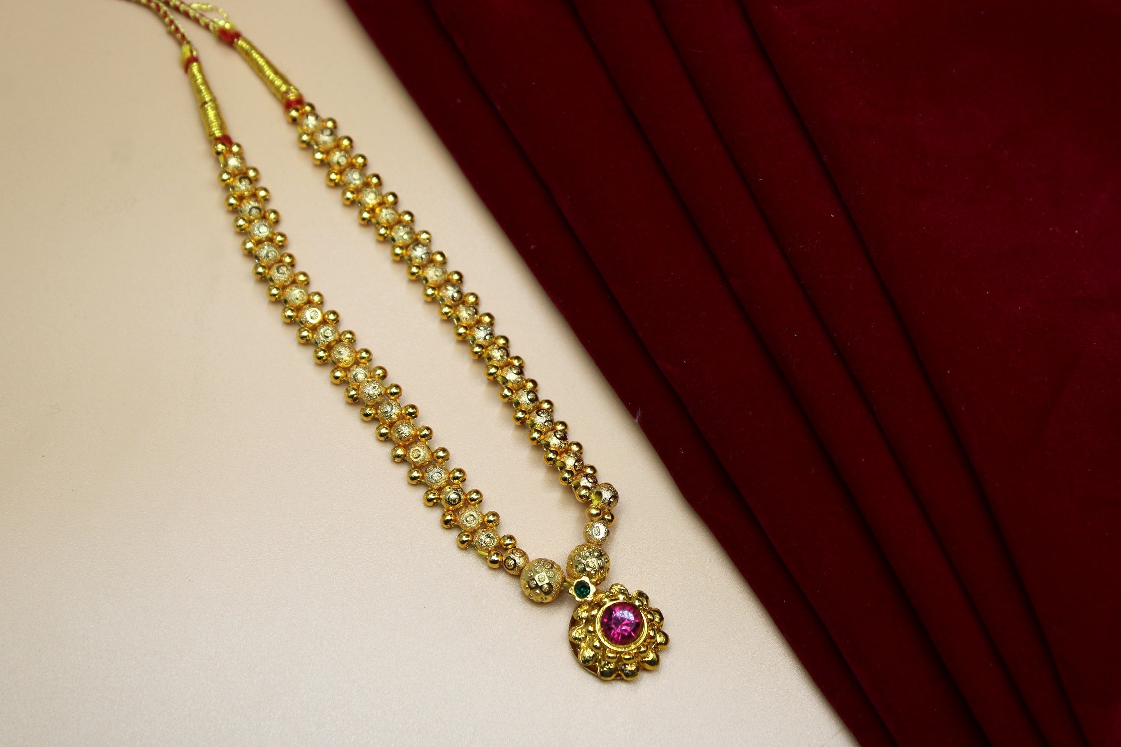 Royal Gold-Plated Floral Pendant Necklace with Pink & Green Stones – Traditional Bridal & Festive Jewellery