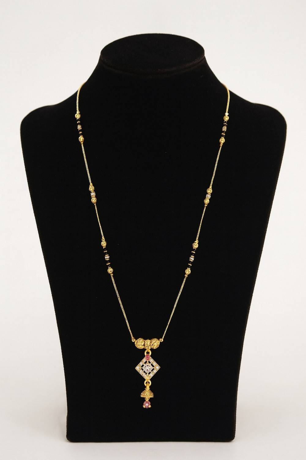 Elegant Double Chain Mangalsutra with Diamond-Shaped Pendant – Gold-Plated Daily Wear Design for Women
