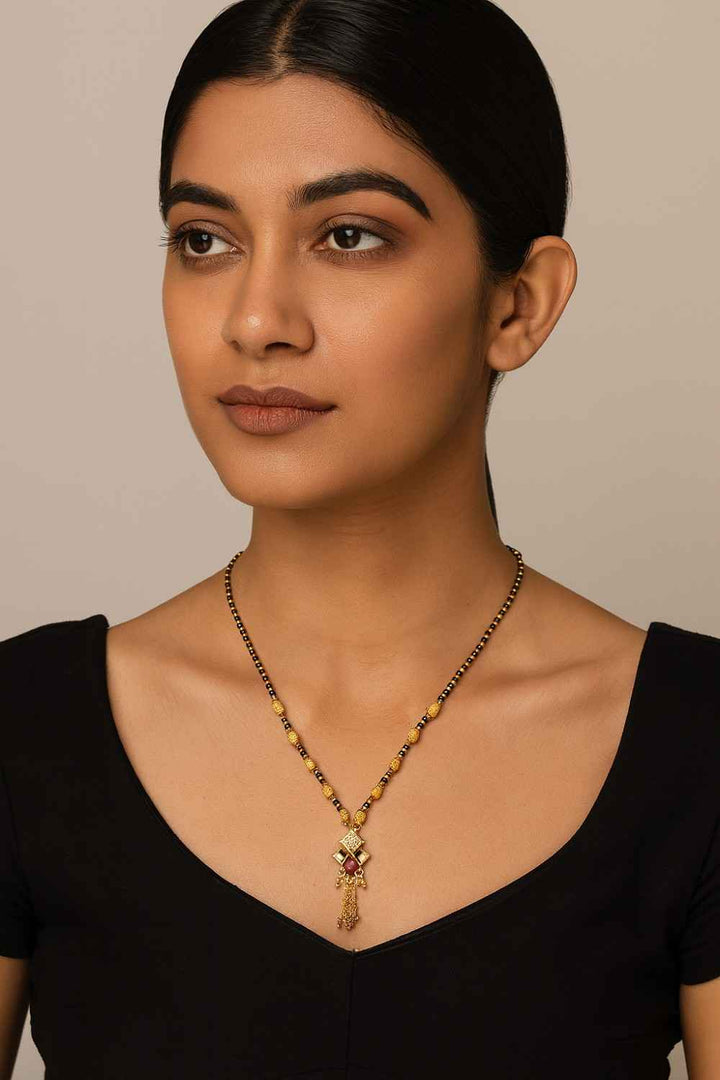 Royal Gold-Plated Traditional Mangalsutra – Purple Stone Pendant with Black Beads