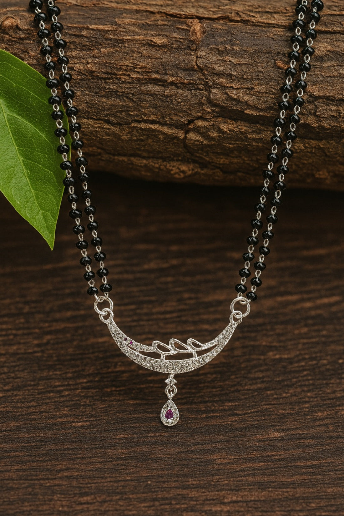Silver-Plated Double Chain Mangalsutra with CZ Leaf Design & Ruby Drop Pendant – Elegant Daily Wear