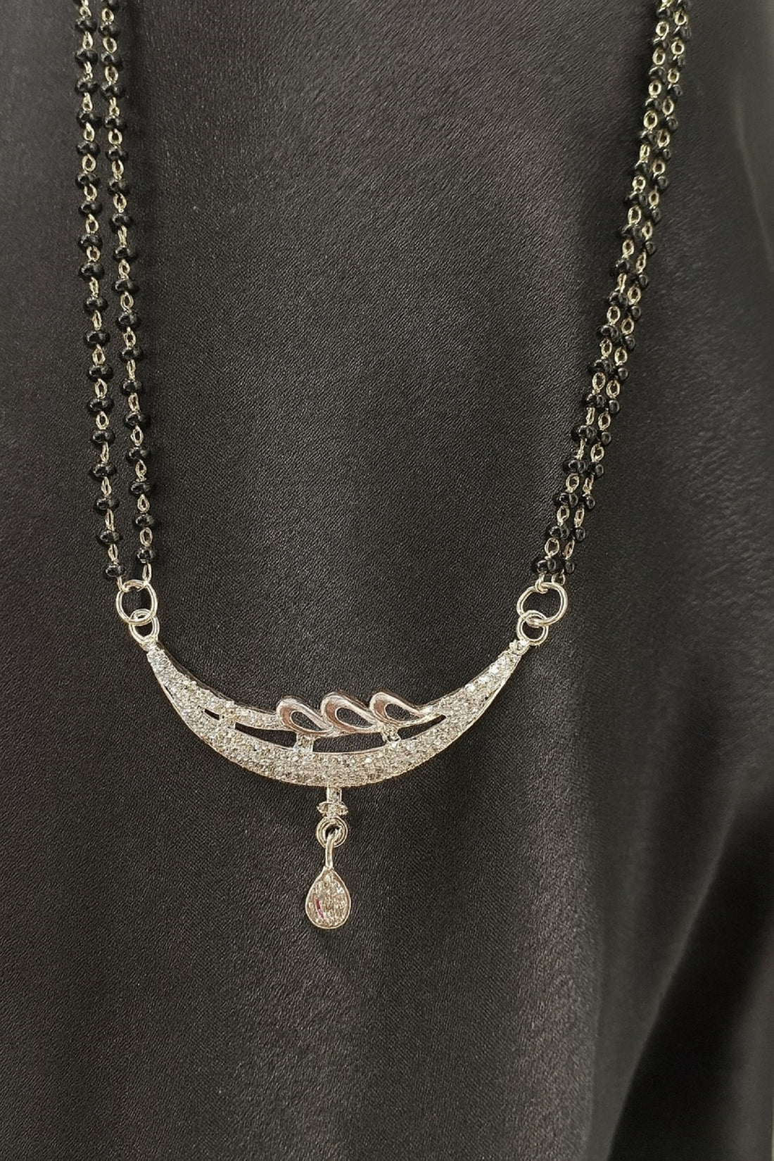 Silver-Plated Double Chain Mangalsutra with CZ Leaf Design & Ruby Drop Pendant – Elegant Daily Wear