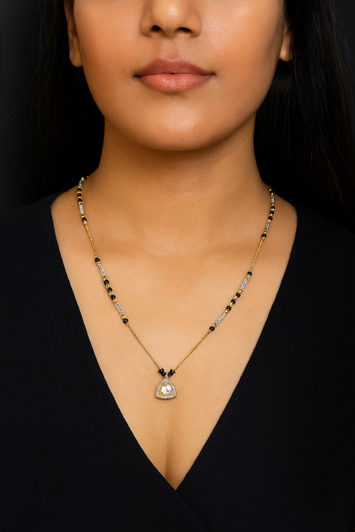 Gold-Plated Mangalsutra with Black Beads & Stone-Studded Triangle Pendant – Elegant Daily Wear