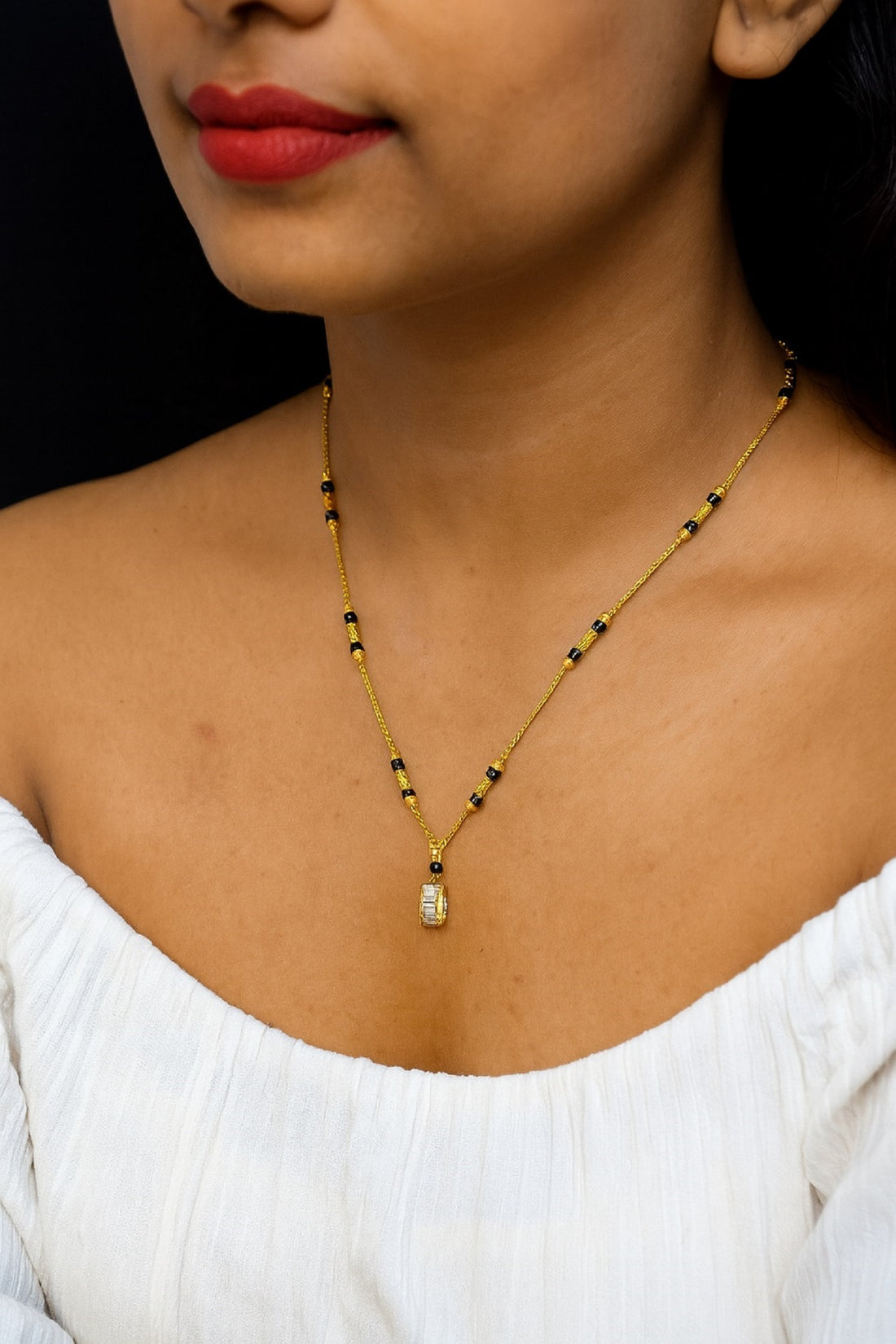 Gold-Plated Mangalsutra with Black Beads & Stone-Studded Barrel Pendant – Elegant Daily Wear