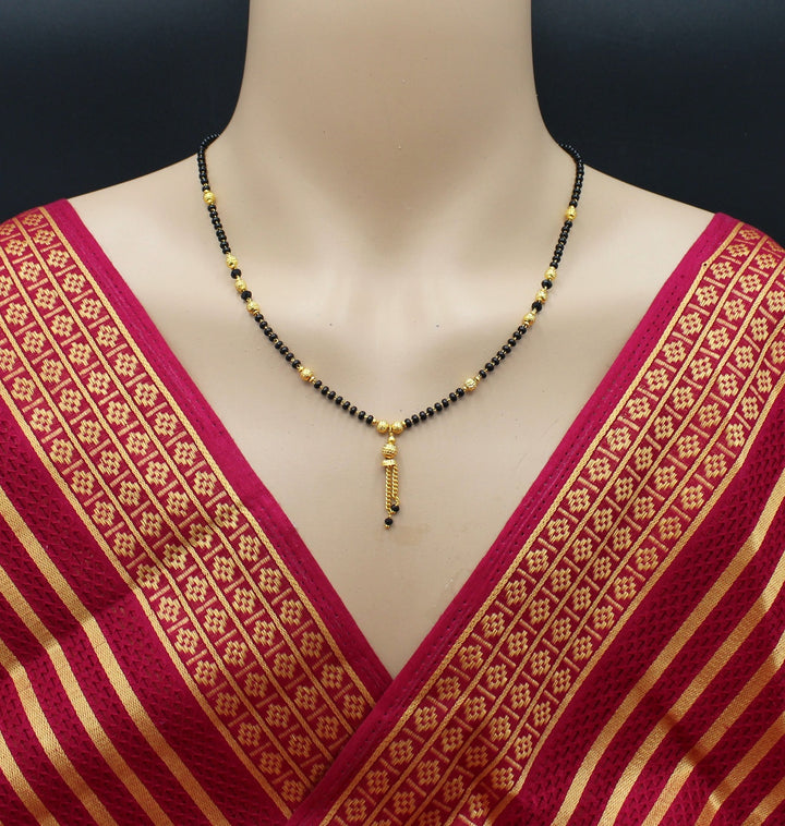 Elegant Daily Wear Gold Plated Black Bead Mangalsutra with Hanging Tassel – Simple & Classy Design 💛