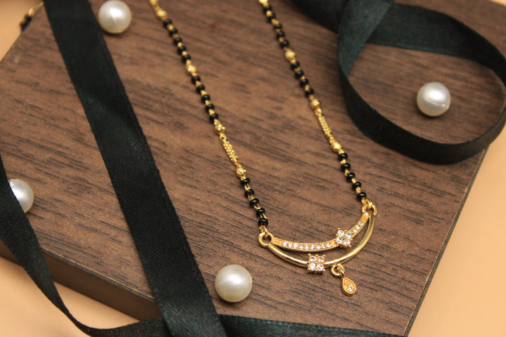 Designer Gold-Plated Mangalsutra with Dual CZ Charms & Black Beads