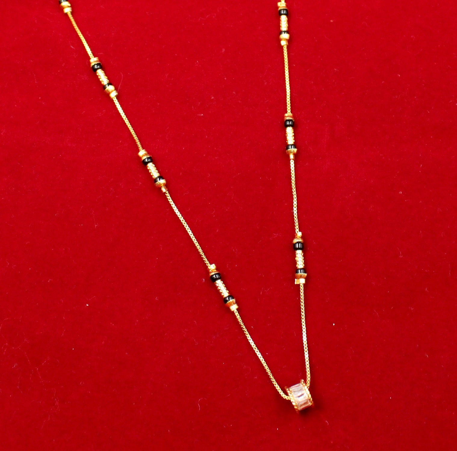 Gold-Plated Mangalsutra with Black Beads & Stone-Studded Barrel Pendant – Elegant Daily Wear