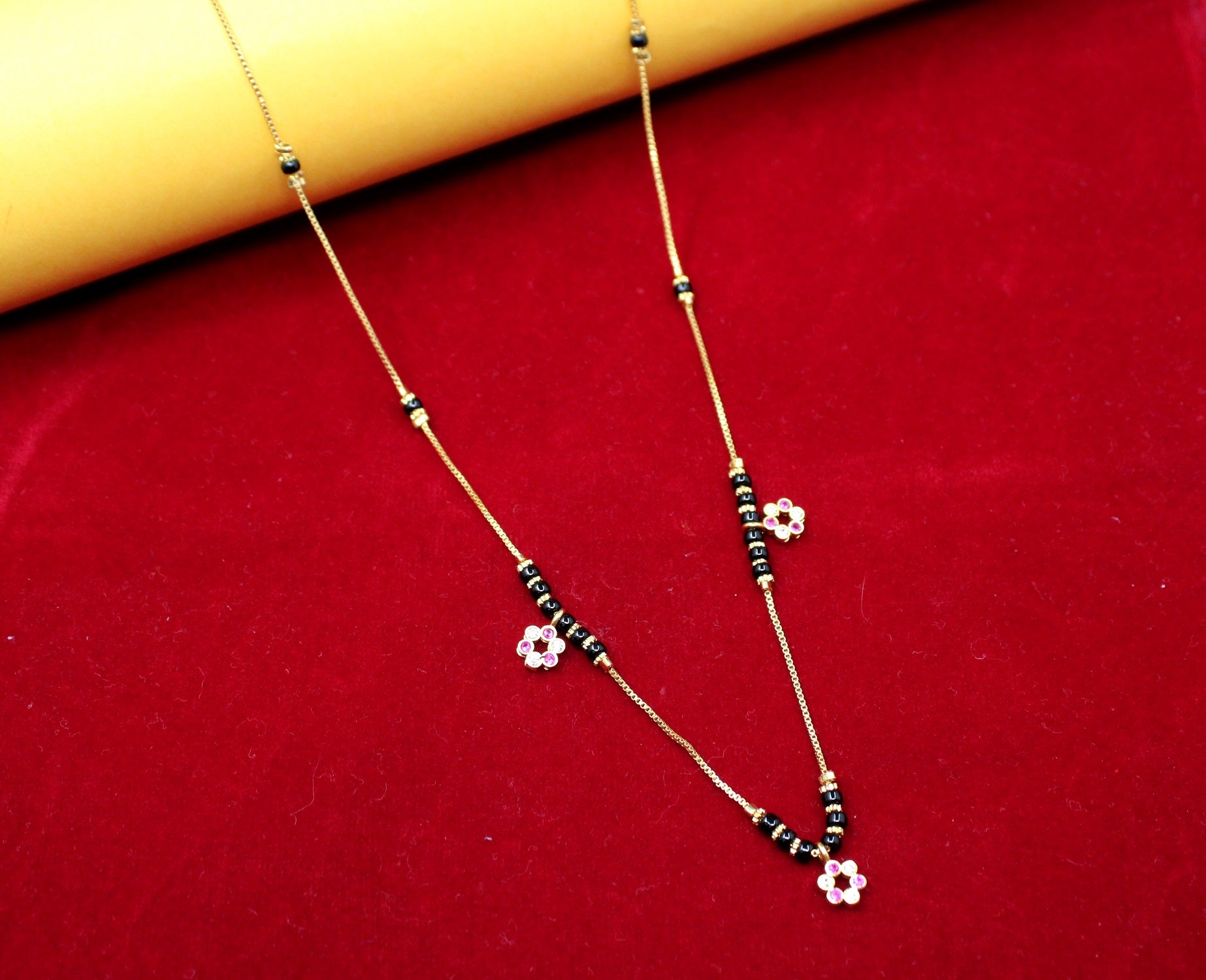 Gold-Plated Mangalsutra with Black Beads & Floral Charms – Lightweight Daily Wear Design