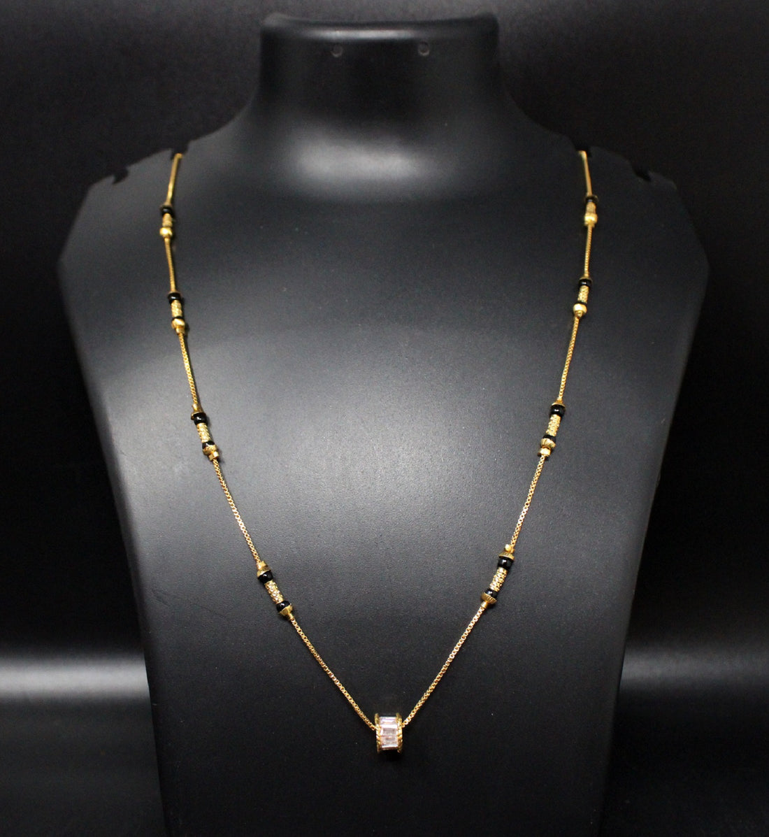 Gold-Plated Mangalsutra with Black Beads & Stone-Studded Barrel Pendant – Elegant Daily Wear