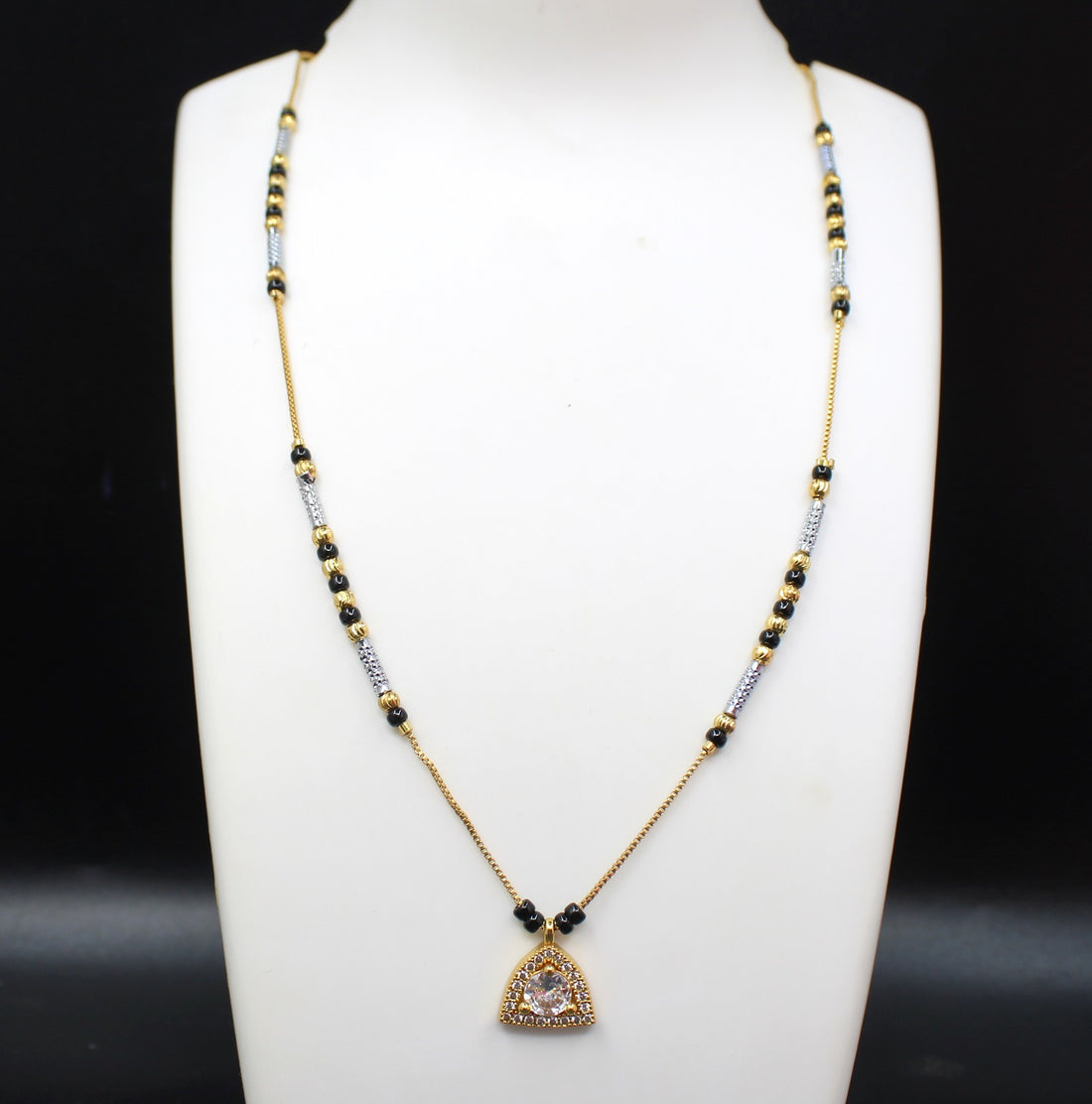 Gold-Plated Mangalsutra with Black Beads & Stone-Studded Triangle Pendant – Elegant Daily Wear